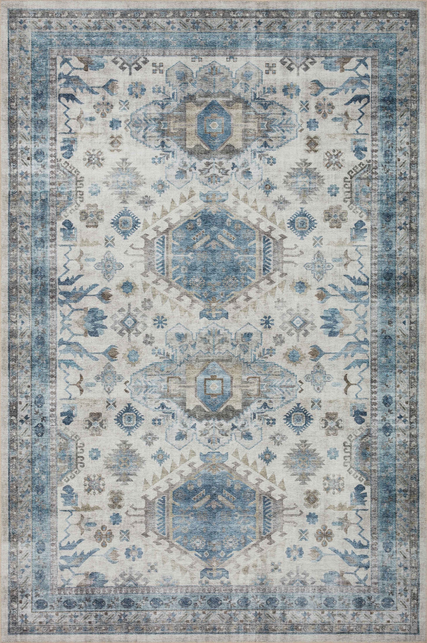 A picture of Loloi's Heidi rug, in style HEI-04, color Ivory / Ocean
