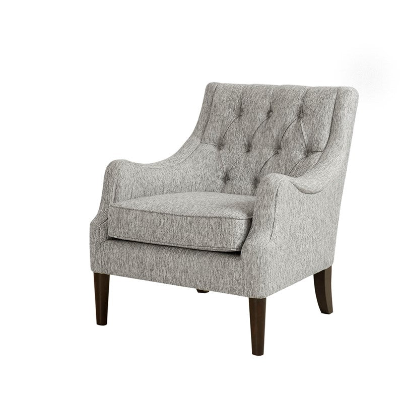 Gray upholstered armchair with tufted backrest on a white background