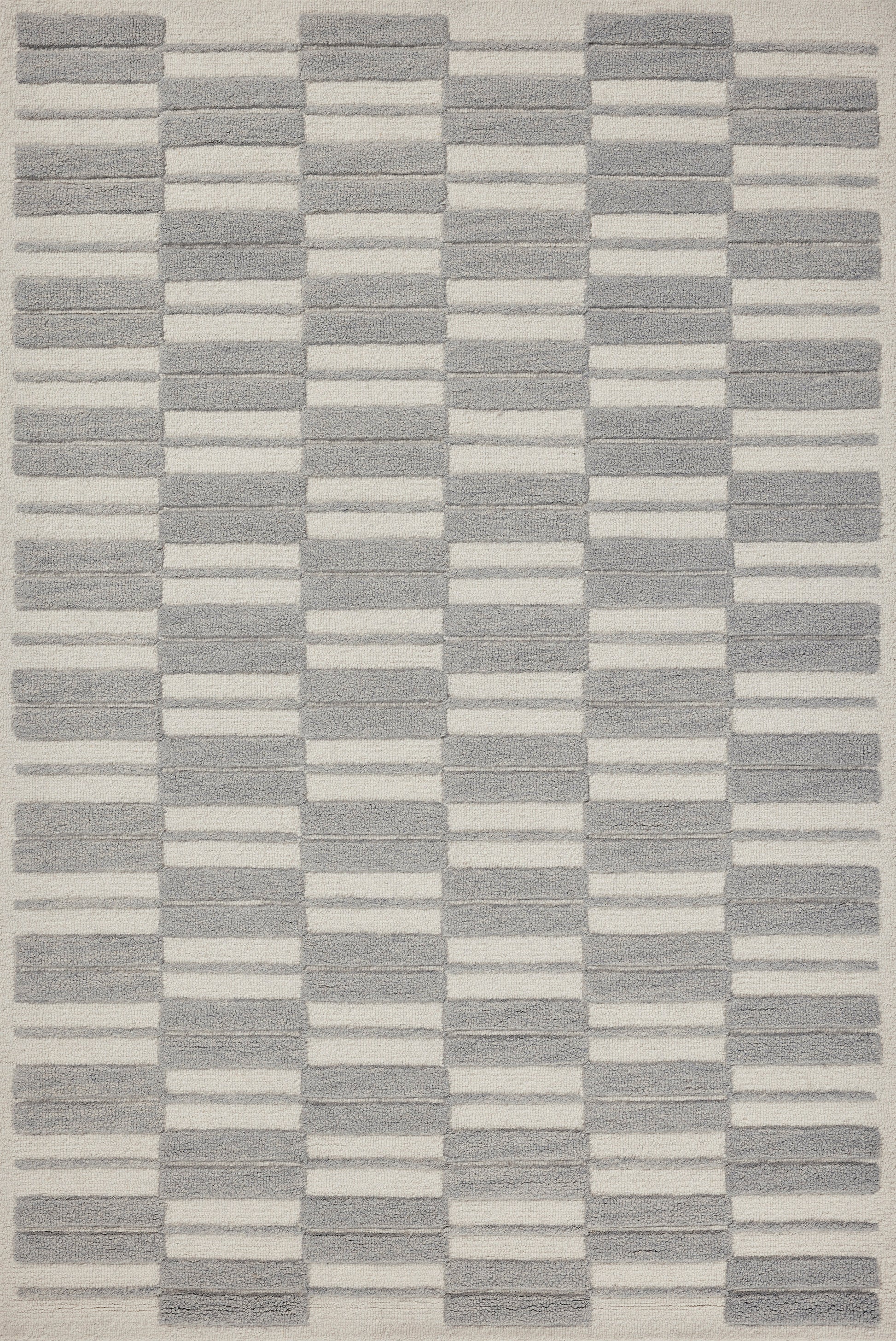 A picture of Loloi's Bradley rug, in style BRL-03, color Ivory / Grey