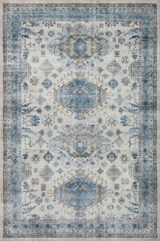 A picture of Loloi's Heidi rug, in style HEI-04, color Ivory / Ocean