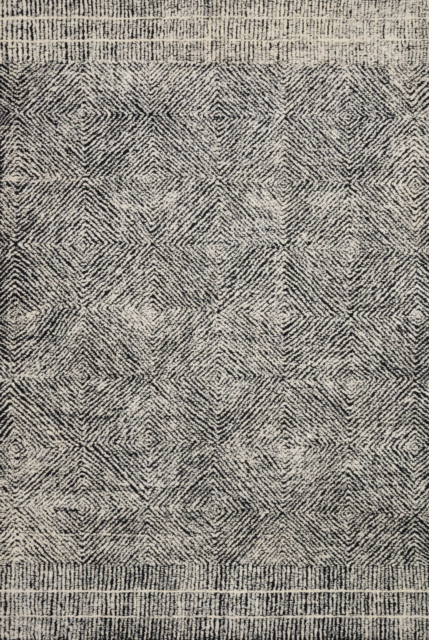 A picture of Loloi's Kopa rug, in style KO-01, color Black / Ivory