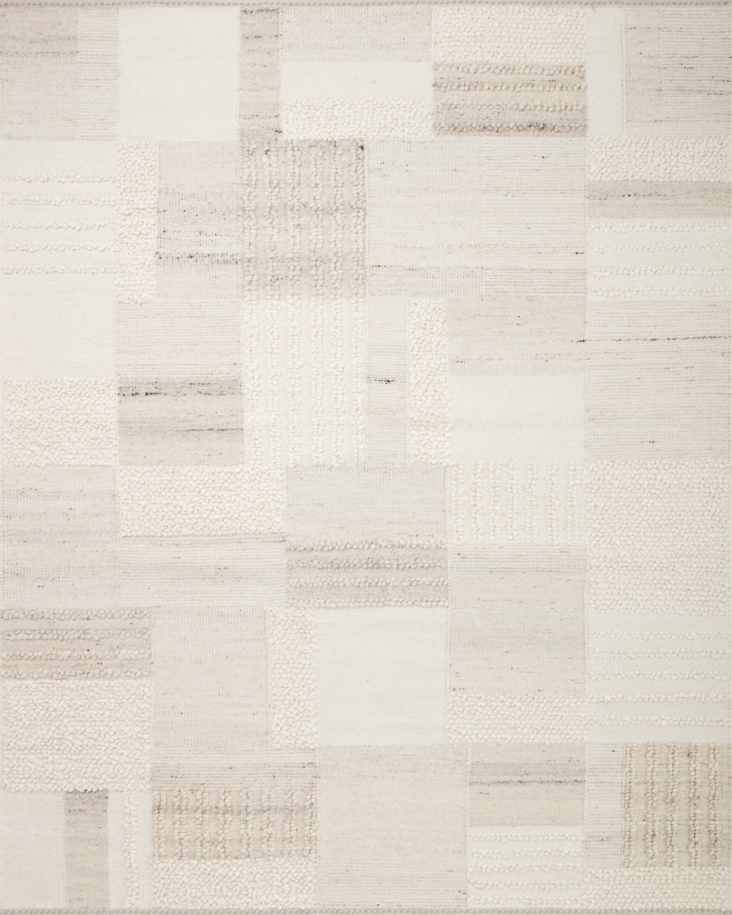 A picture of Loloi's Manfred rug, in style MAN-01, color Ivory / Pebble